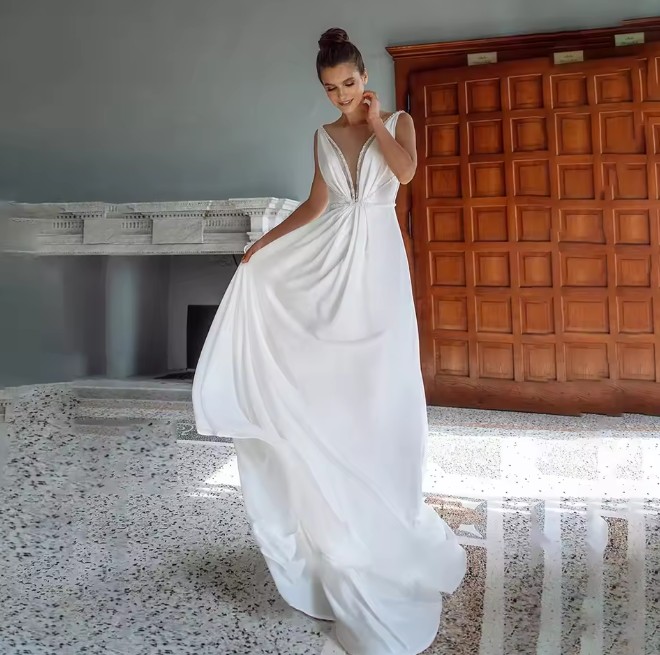 Empire Brautkleid Dyrken Ärmellos mit V Ausschnitt und Pailletten